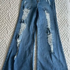 Never worn flared jeans. Size 28/7